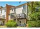 Back of home with a charming deck and well-maintained landscaping, providing a great outdoor space at 104 Terrace Ne Dr # 1, Atlanta, GA 30305