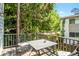 Charming patio with a table and chairs, perfect for outdoor dining at 104 Terrace Ne Dr # 1, Atlanta, GA 30305