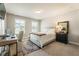 Cozy bedroom featuring a bed, two windows, carpet, and neutral walls at 120 Maple Creek Way, Woodstock, GA 30188