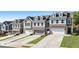 Exterior of townhomes featuring attached garages and inviting curb appeal at 120 Maple Creek Way, Woodstock, GA 30188