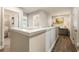 Upstairs landing boasting hardwood floors and a view of the tastefully decorated living spaces at 120 Maple Creek Way, Woodstock, GA 30188