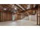 Unfinished basement with exposed beams, awaiting your personal design touch at 279 Sturry Dr, Mcdonough, GA 30252