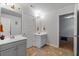 Bright bathroom features double vanities and ample space at 279 Sturry Dr, Mcdonough, GA 30252