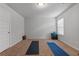 Carpeted bonus room featuring natural light, complemented by gray walls and a modern fixture at 279 Sturry Dr, Mcdonough, GA 30252