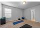 Spacious bonus room with carpet and natural light perfect for a home gym and/or entertainment at 279 Sturry Dr, Mcdonough, GA 30252