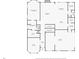 Detailed first-floor plan featuring living room, primary bedroom, kitchen, office, and garage layout at 279 Sturry Dr, Mcdonough, GA 30252