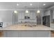 Island kitchen with granite countertops, stainless appliances, and pendant lighting at 279 Sturry Dr, Mcdonough, GA 30252