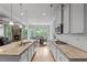 Large kitchen with stainless steel appliances, granite counters, and eat-in area at 279 Sturry Dr, Mcdonough, GA 30252