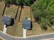 Aerial view of a home's backyard with fences and lawns near a neighborhood road at 435 Noblewood Dr, Mcdonough, GA 30252