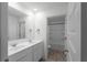 Bright, clean bathroom with double sink vanity and access to tub and shower area at 435 Noblewood Dr, Mcdonough, GA 30252