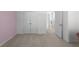 Bedroom with carpet floor and double door closets, offering ample storage space at 435 Noblewood Dr, Mcdonough, GA 30252