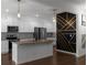 Modern kitchen with stainless steel appliances, granite countertops, and a center island perfect for cooking at 435 Noblewood Dr, Mcdonough, GA 30252