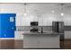 Modern kitchen with granite countertops, stainless steel appliances, and a center island, creating an inviting space at 435 Noblewood Dr, Mcdonough, GA 30252
