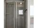 Tiled shower with glass doors and an additional soaking tub in bathroom at 435 Noblewood Dr, Mcdonough, GA 30252