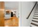 Inviting living room with hardwood floors, adjacent kitchen and staircase, creating an open, airy feel at 798 Saint Charles Ne Ave # 7, Atlanta, GA 30306