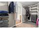 Walk-in closet features wire shelving, closet organizers, and a view out to the bedroom beyond at 920 Pebblestone Ct, Alpharetta, GA 30009