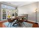 Cozy dining area with natural light and hardwood floors at 920 Pebblestone Ct, Alpharetta, GA 30009