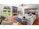 Bright and spacious living room with fireplace and large windows at 920 Pebblestone Ct, Alpharetta, GA 30009