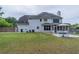 Spacious backyard with patio area, ideal for relaxation and gatherings at 1004 Spruce Creek Ln, Lawrenceville, GA 30045