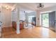 Bright living room with wood floors, large windows and comfortable furnishings at 1004 Spruce Creek Ln, Lawrenceville, GA 30045