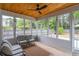 Relaxing sunroom with lots of natural light and a backyard view at 1004 Spruce Creek Ln, Lawrenceville, GA 30045