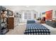 A spacious bedroom with two beds, a dresser, and Americana themed decor at 1307 Cedarcrest Blvd, Acworth, GA 30101