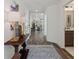 Inviting home entryway with hardwood floors, stylish décor, and views into the spacious living areas at 1307 Cedarcrest Blvd, Acworth, GA 30101