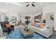 Open-concept living area with a modern kitchen, comfortable seating, and seamless flow for entertaining at 1307 Cedarcrest Blvd, Acworth, GA 30101