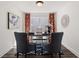 Bright home office with two chairs, modern decor, a blue rug, and natural light from a window at 1307 Cedarcrest Blvd, Acworth, GA 30101