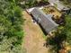 Aerial view of a home with a backyard patio area at 250 Hembree Rd, Roswell, GA 30075