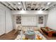 Finished basement featuring a ' play area, shelving, and bright recessed lighting with new hardwood floors at 250 Hembree Rd, Roswell, GA 30075