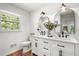 Bright bathroom with double vanity, modern fixtures, and natural light at 250 Hembree Rd, Roswell, GA 30075
