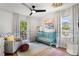 Cheerful bedroom with colorful accents, ample natural light, and a cozy atmosphere at 250 Hembree Rd, Roswell, GA 30075