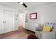 Charming bedroom with cozy seating, white dresser, and bright decor at 250 Hembree Rd, Roswell, GA 30075