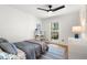 Bright bedroom with hardwood floors, natural light, and neutral decor at 250 Hembree Rd, Roswell, GA 30075