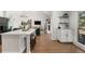 Open-concept kitchen featuring a center island and stainless steel appliances at 250 Hembree Rd, Roswell, GA 30075