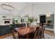 Open living space boasts a fireplace, dining area, and stylish home office at 250 Hembree Rd, Roswell, GA 30075