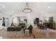 Bright living space merges a stylish kitchen, dining, and office with an inviting living area at 250 Hembree Rd, Roswell, GA 30075