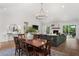 Inviting space with open layout features a modern lighting and direct outdoor access at 250 Hembree Rd, Roswell, GA 30075