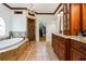 This bathroom features a garden tub, walk-in shower, and and sinks at 5122 Cantrell Se Pt, Acworth, GA 30101