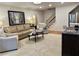 Comfortable living room featuring plush seating and a decorative painting at 5122 Cantrell Se Pt, Acworth, GA 30101