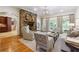 Elegant living room with stone fireplace, hardwood floors, and ample natural light at 5122 Cantrell Se Pt, Acworth, GA 30101