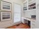 Bright office with built-in shelves, white cabinetry, and a window offering natural light at 5122 Cantrell Se Pt, Acworth, GA 30101