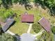 Aerial view of the home showcasing its roof, yard, and proximity to neighboring properties at 7371 Ovis Ct, Riverdale, GA 30274