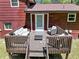 An outdoor seating area is situated on a deck, perfect for relaxation at 7371 Ovis Ct, Riverdale, GA 30274