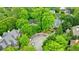 Aerial view of neighborhood homes surrounded by lush greenery, offering a serene and picturesque setting at 1412 Lanier Ne Mnr, Atlanta, GA 30319