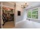 Spacious room with a closet and a large window offering ample sunlight at 1412 Lanier Ne Mnr, Atlanta, GA 30319