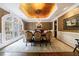 Refined dining area featuring decorative wallpaper, a chandelier, and a grand window at 1412 Lanier Ne Mnr, Atlanta, GA 30319