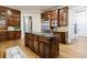 Gourmet kitchen featuring a kitchen island with black countertops, custom cabinets, and stainless steel appliances at 1412 Lanier Ne Mnr, Atlanta, GA 30319
