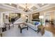 Spacious living room showcasing coffered ceilings, fireplace, hardwood floors, and staircase at 1412 Lanier Ne Mnr, Atlanta, GA 30319